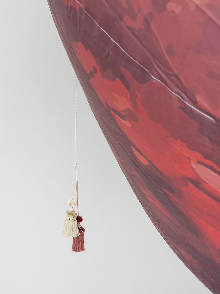 Detail of RM, Cherries, 2020. UV-printed PVC, textile, rope and pompons 450 x 950 x 400 cm. [n° inv 2022-080] Collection du Fonds d'art contemporain de la Ville de Genève. Courtesy of the Artists and La Rada, Locarno. Photography by Riccardo Giancola