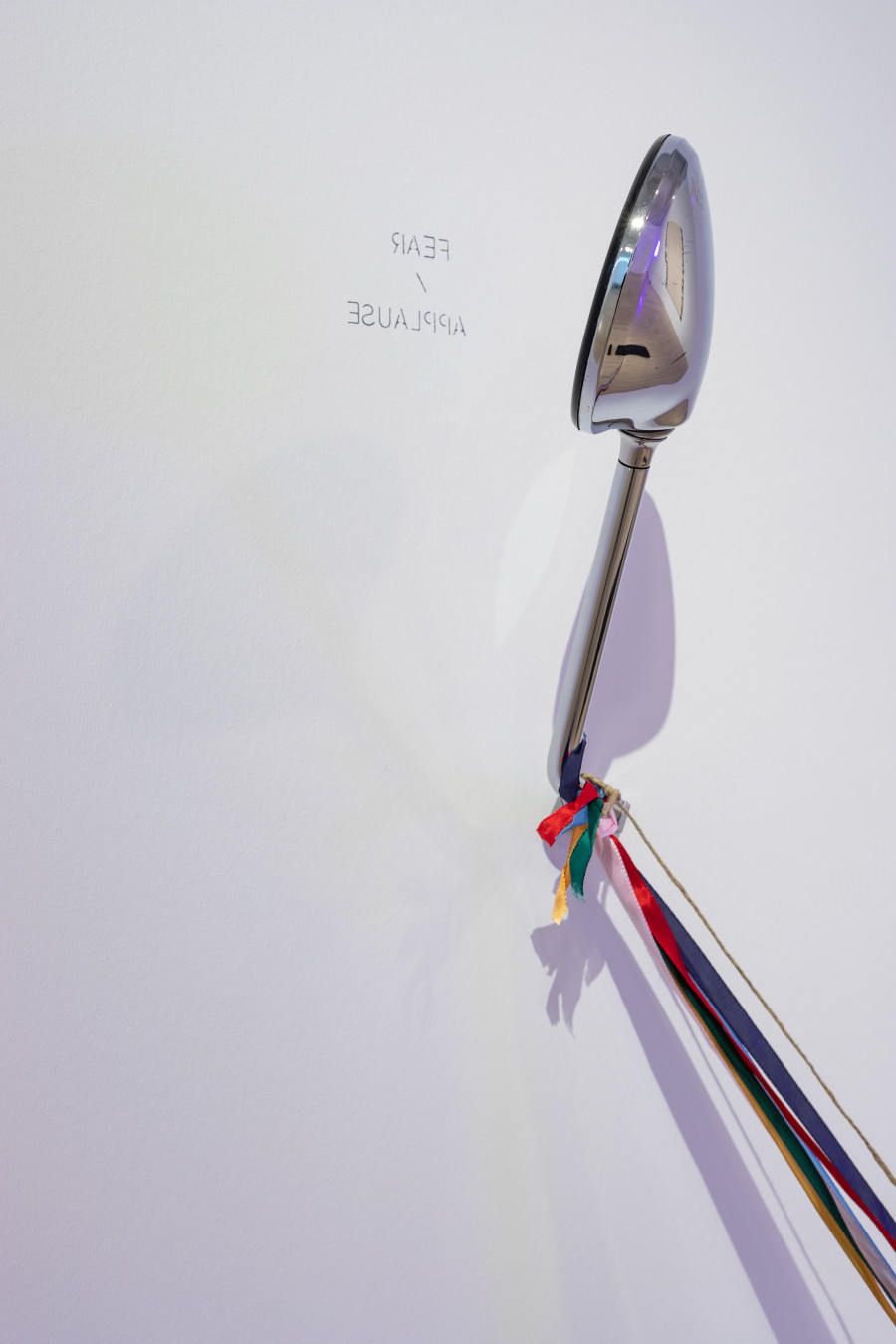 Vittorio Santoro, Memories of a Bird (Rear-View Mirror), II (detail), 2020, Bronze casting of a Wood Plank, Silk ribbons, Hemp string, Vintage rear-view Mirror mounted on wall, Pencil on wall, ca. 170 x 179 x 95 cm. Photo: Kilian Bannwart