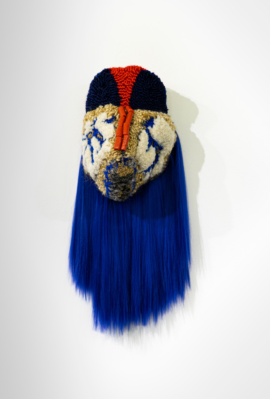 Anna Perach, Tin Women, 2020. Tufted hair, artificial hair, beads. 70 x 25 x 25 cm. Courtesy of artist and VITRINE London/Basel.