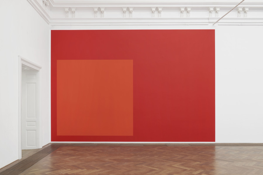 Ghislaine Leung, Leave, 2024, detail, in: Ghislaine Leung, Commitments, Kunsthalle Basel, 2024, photo: Philipp Hänger / Kunsthalle Basel. Score: A wall is equivalent to all the days in a year. The 118 days between one exhibition by the artist and the next are shown as a tomato rectangle. The 37 days the artist was on unpaid sick leave in this period due to surgery are shown inset as a tangerine square. All works courtesy the artist; Maxwell Graham, New York; and Cabinet, London.