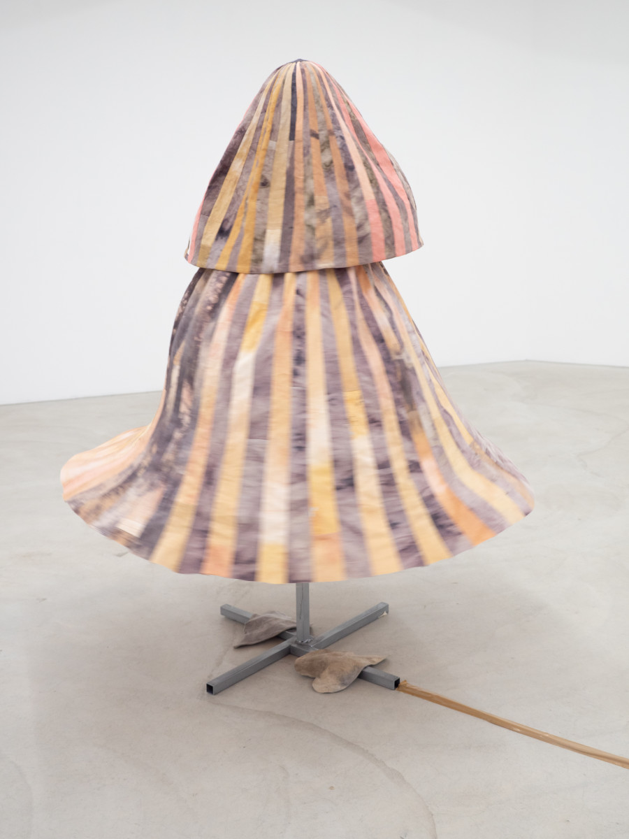 You try to hide me under layers of cloth but I’m still there, Anna Reutinger, Second hand linen, cotton, iron, tannic acid, onion skins, madder, alder buckthorn, steel, servomotor, 178 x 77 x 77 cm