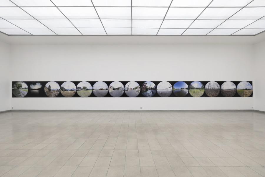 Emanuel Rossetti, Walks, 2024. UltraChrome HDR ink on Enhanced Matte paper, mounted on linen, 110 x 1650 cm. Emanuel Rossetti, Stimmung, installation view, Kunsthaus Glarus, 2024. Photo: Gina Folly. Courtesy of the artist, Karma International, Zurich and Jan Kaps, Cologne.