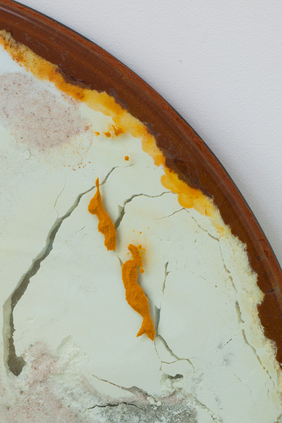 Monia Ben Hamouda, The Luncay of Lunar Sightings (Hourglass III) (detail), 2022, Glass, chilli pigmented silicon, spices, 80 x 80 x 3.5 cm. From the solo show The Eye, the Hands, the Lunacy of Lunar Sightings, curated by Anissa Touati, jevouspropose, Zurich, 2022. Courtesy of the artist and ChertLüdde, Berlin