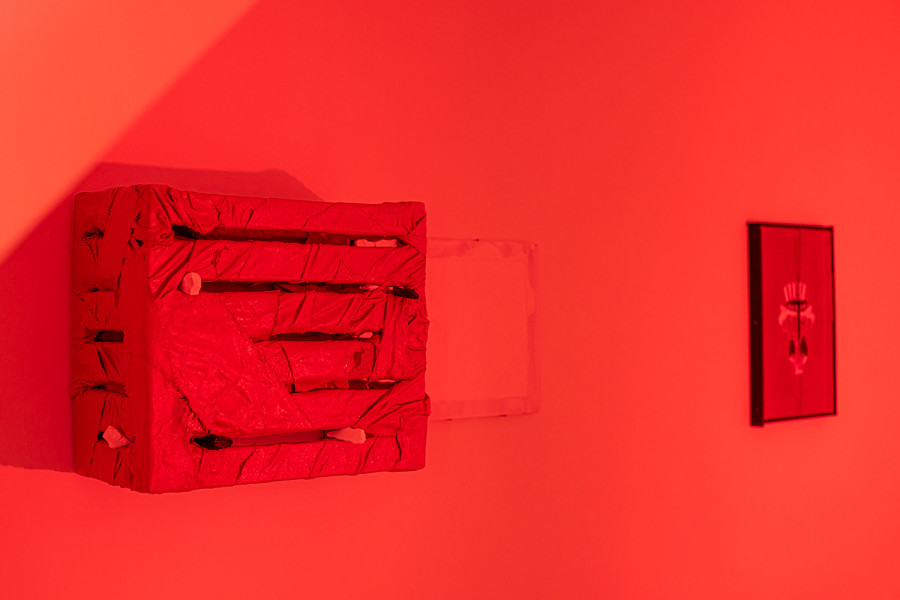 Exhibition View Solo Show Sylvain Gelewski «A Home Is A Home; view on Sylvain Gelewski, AHIAH (stripes), 2024, lacquer on scrap textile and canvas laminated on found wood box, plaster, 32 x 40 x 20 cm» at Peripherie 8, Basel, 2024 / Photo: Stefan Schmidlin / Courtesy: Peripherie 8