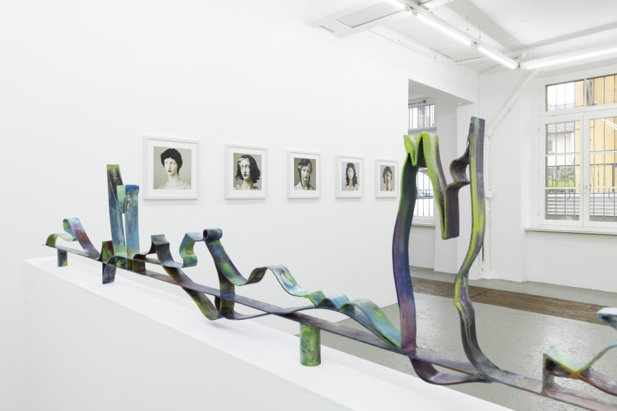 Héloïse Chassepot, London skyline, in real flesh, Metal, oil paint, vanish, 16 1/8 × 116 17/32 × 1 9/16, 41 × 296 x 4 cm, unique, 2025. KALI Gallery, Luzern, 2025. Credit photo: Liv Burkhard