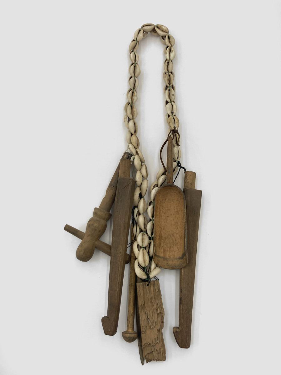 Bernhard Schobinger, Untitled, 1995, Necklace made of wood, cowrie shells, string, 40.5 x 14.5 x 3.5 cm, Neckline 76 cm