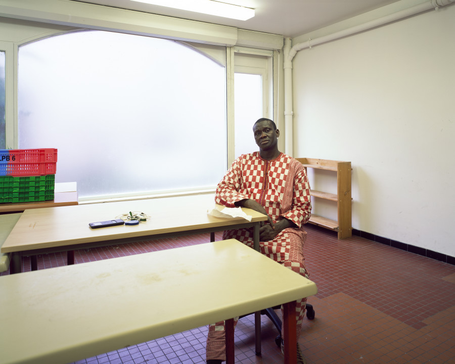 Boubacar Diallo, elected member of the consultation committee of the ADEF residence in Saint-Ouen, led the fight for a dignified rehousing of the residents following their evacuation to allow the destruction of the residence, which is located within the perimeter of the future Olympic village, Saint-Ouen, January 23, 2021. Inkjet print (Canson Baryta Photographique paper) mounted on Dibond, Plexiglas box, 126 x 157 x 5 cm, Ed. 2/5 + 2 AP