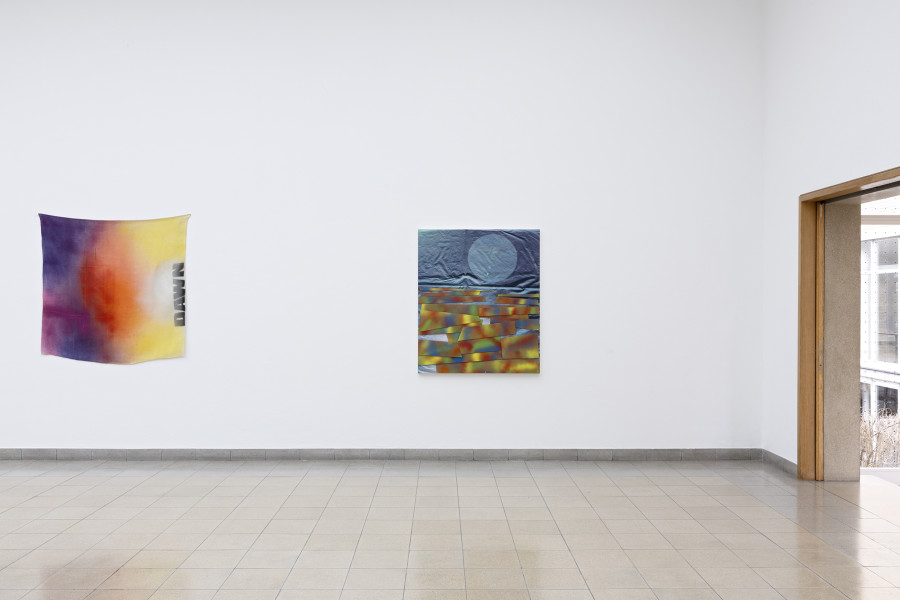 Rochelle Feinstein, The Today Show, installation view, Kunsthaus Glarus, 2025. Photo: Gina Folly. Courtesy the artist, Candice Madey Gallery and Galerie Francesca Pia, Zurich. Dawned, 2022, Acrylic, acrylic enamel spray paint on cotton drop cloth, 130 x 130 cm / 51 x 51 in. Memory Hole #4, 2003–2024, UV print, acrylic, acrylic spray paint, cardboard on canvas, 127 x 106.7 cm / 50 x 42 in