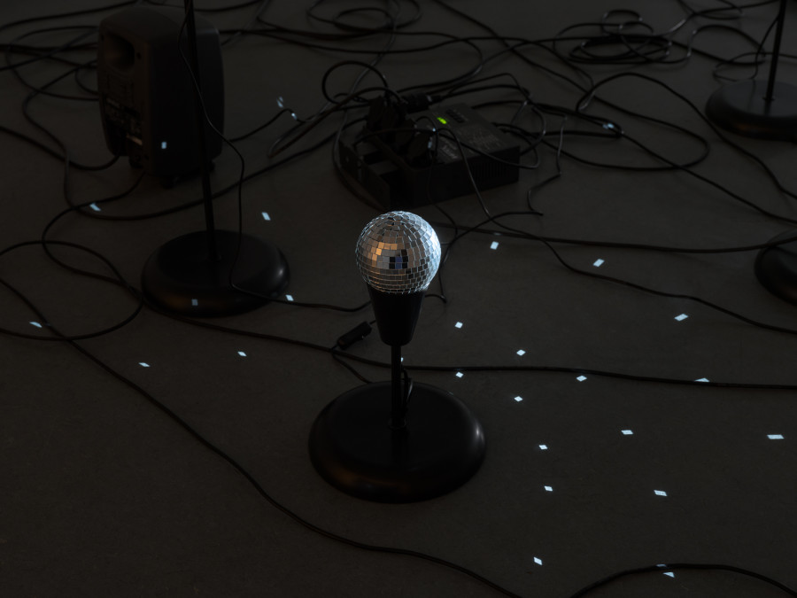 Daria Blum, HOME SCREEN, detail, 2026, Programmed video, sound and light script, 20 IKEA TÅGARP lamps, 3 BOTEX DMX-Switchpacks, disco ball, loop, Dimensions variable. Photo credits: Julian Blum