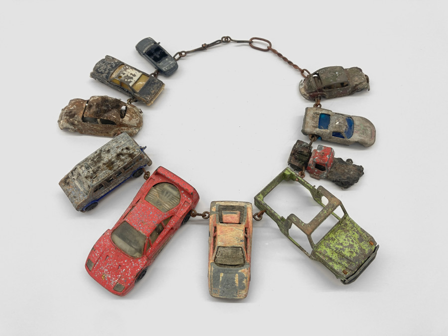 Bernhard Schobinger, Under Water Car Collection, 2023, Necklace made of metal, plastic, copper, silver, algae, 28 x 26 x 3.3 cm, Neckline 56 cm