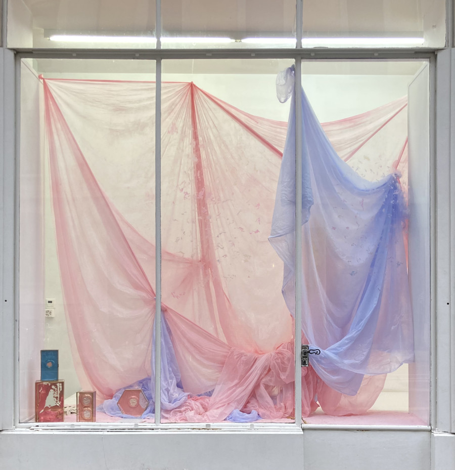 Exhibition view, Karla Black, Galerie Mezzanin, 2025. Never Known To Figure, 2023/2025, polythene dust sheets, plaster powder, powder paint, thread, uv lipsticks, acrylic paint, eyeshadows, highlighter powder, vaseline, jewellery boxes, variable dimensions
