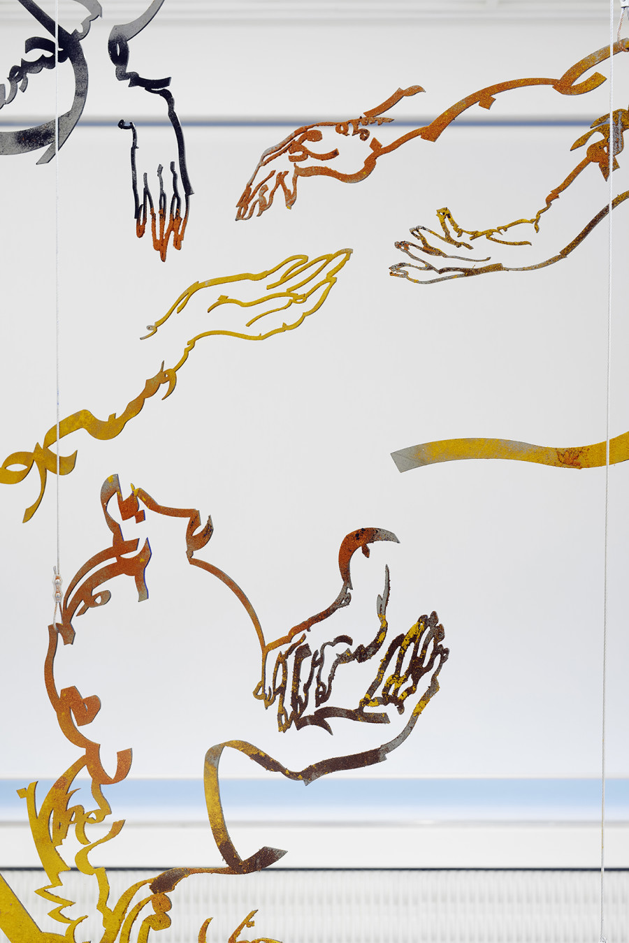 Monia Ben Hamouda, Aniconism as Figurative Urgency (the Eye, the Hands) (detail), 2022, Laser cut steel, spice powders, ca 256 x 290 x 0.3 cm. Installation view from the solo show The Eye, the Hands, the Lunacy of Lunar Sightings, curated by Anissa Touati, jevouspropose, Zurich, 2022. Courtesy of the artist and ChertLüdde, Berlin, photo: Hannes Heinzer