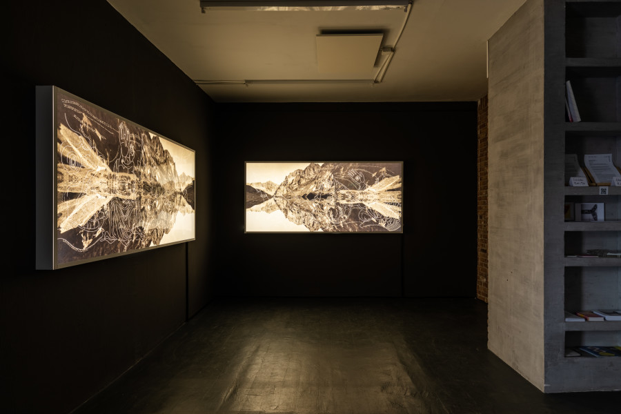 Left: Leila Peacock, As Above So Below - Now..., 2023, Plexiglass LED lightbox drawing scratched into Duraclear prints, 225 x 105 cm. Right: Leila Peacock, As Above So Below - Then..., 2023, Plexiglass LED lightbox drawing scratched into Duraclear prints, 225 x 105 cm. Photo: Kilian Bannwart